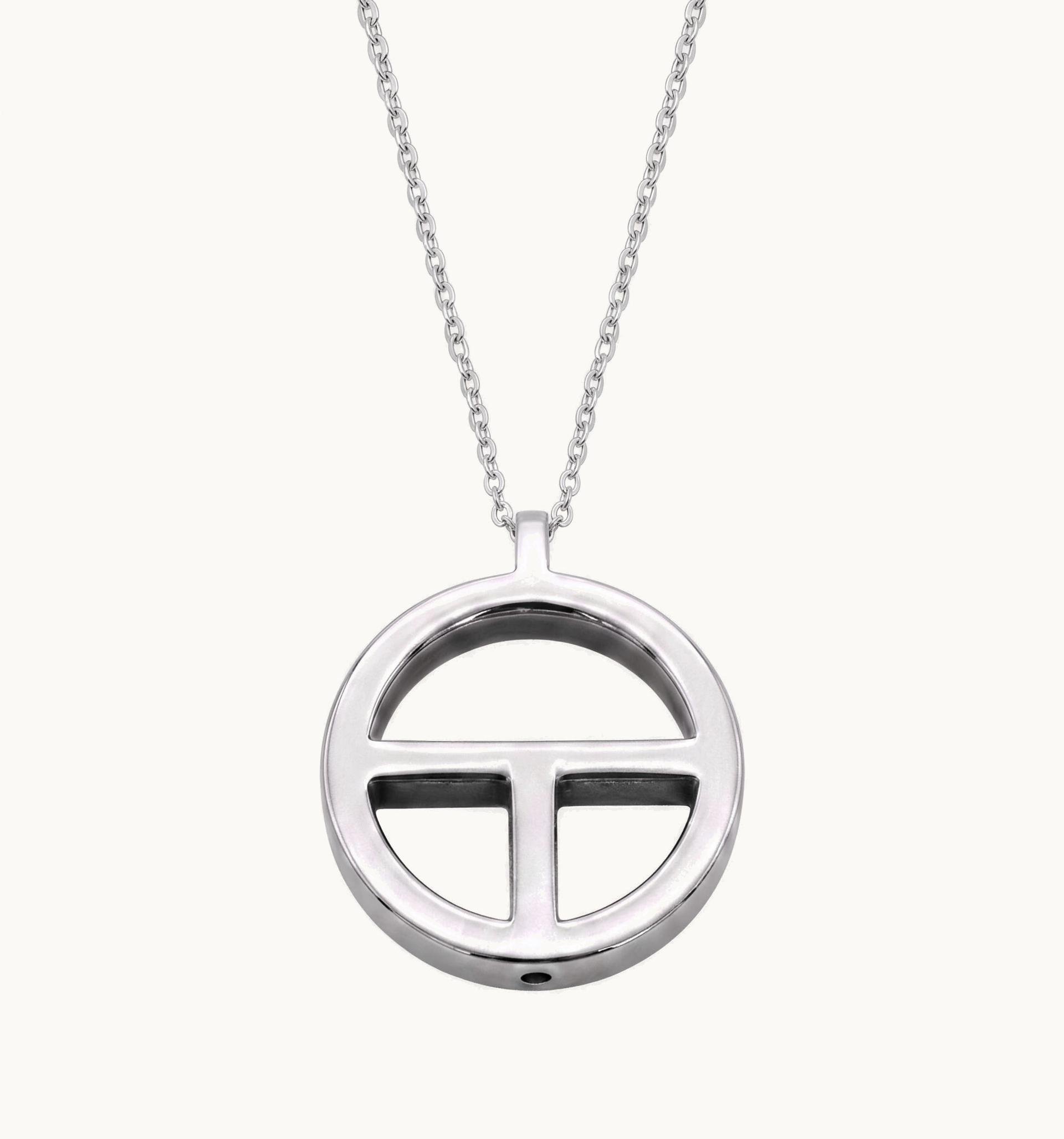 TOKIN pendant displayed full length on its chain